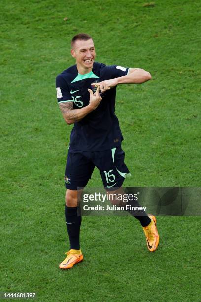 Mitchell Duke of Australia celebrates after scoring their team's first goal during the FIFA World Cup Qatar 2022 Group D match between Tunisia and...