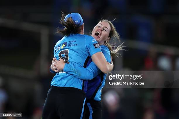 Tahlia McGrath and Amanda-Jade Wellington of the Strikers celebrate victory in the Women's Big Bash League Final between the Sydney Sixers and the...