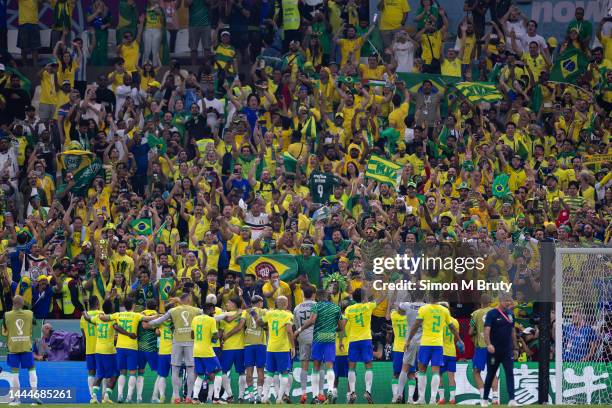 Brazil celebrate with their fans at full-time during the FIFA World Cup Qatar 2022 Group G match between Brazil and Serbia at Lusail Stadium on...