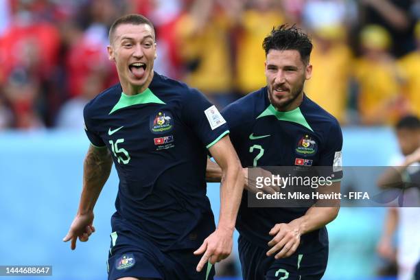 Mitchell Duke of Australia celebrates with Mathew Leckie after scoring their team's first goal during the FIFA World Cup Qatar 2022 Group D match...