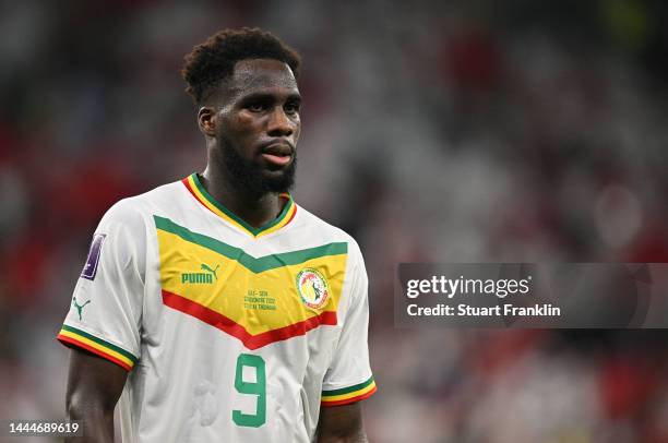 Boulaye Dia of Senegal looks on during the FIFA World Cup Qatar 2022 Group A match between Qatar and Senegal at Al Thumama Stadium on November 25,...