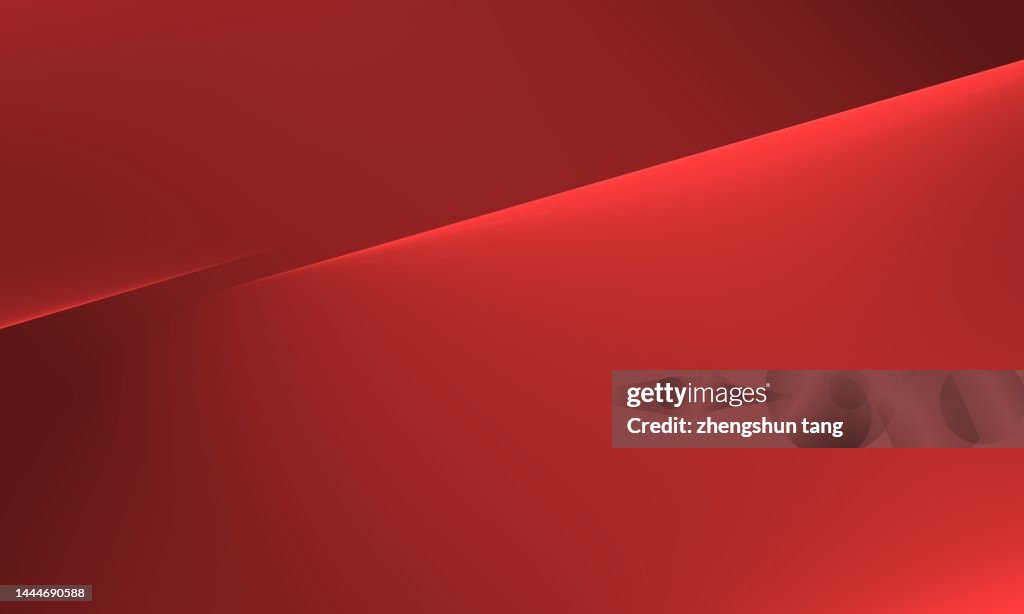 Abstract red inclined plane shaped stacking under lights.