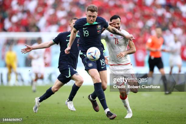 Harry Souttar of Australia controls the ball against Taha Yassine Khenissi of Tunisia during the FIFA World Cup Qatar 2022 Group D match between...