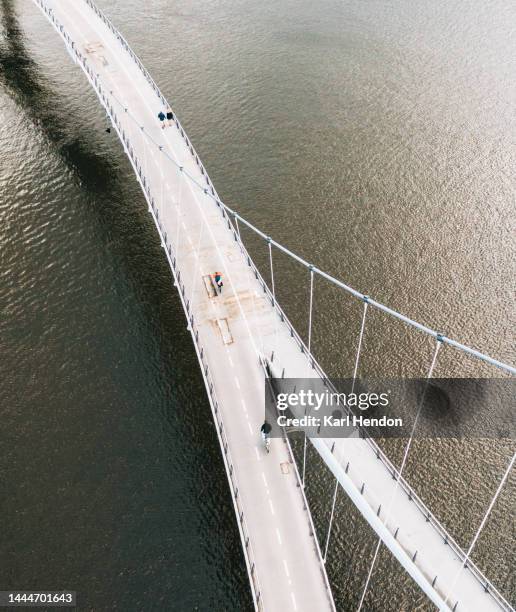 an elevated view of the nescio bridge in amsterdam - fluss amstel stock-fotos und bilder