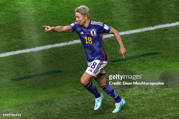 Takuma Asano of Japan celebrates after scoring their team's second goal during the FIFA World Cup Qatar 2022 Group E match between Germany and Japan...