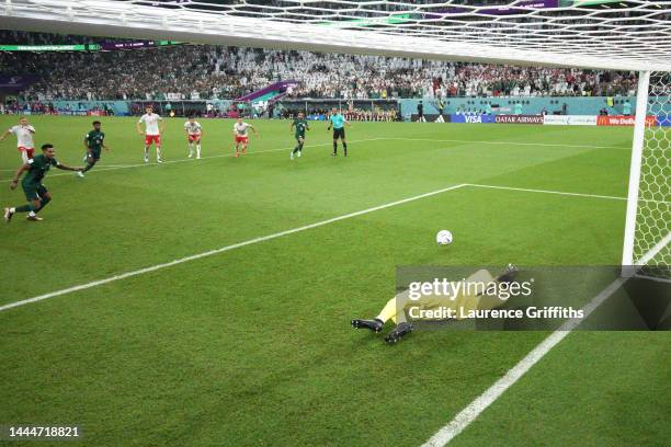 Salem Al-Dawsari of Saudi Arabia takes a penalty saved by Wojciech Szczesny of Poland during the FIFA World Cup Qatar 2022 Group C match between...