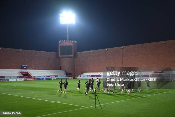 The team warms up during the Germany training session at Al Shamal Stadium on November 25, 2022 in Al Ruwais, Qatar.