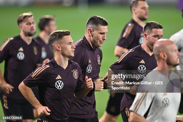 Niklas Suele warms up during the Germany training session at Al Shamal Stadium on November 25, 2022 in Al Ruwais, Qatar.