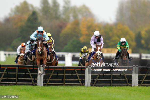 Harry Cobden riding Red Risk clear the last to win The Coral Racing Club Handicap Hurdle at Newbury Racecourse on November 26, 2022 in Newbury,...