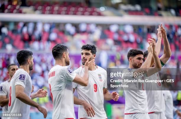 Players of Iran celebrate after the FIFA World Cup Qatar 2022 Group B match between Wales and Iran at Ahmad Bin Ali Stadium on November 25, 2022 in...