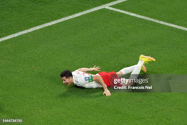 Robert Lewandowski of Poland celebrates after scoring their team's second goal during the FIFA World Cup Qatar 2022 Group C match between Poland and...