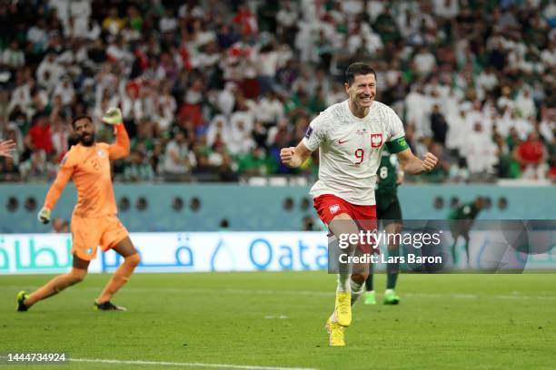 Robert Lewandowski of Poland celebrates after scoring their team's second goal during the FIFA World Cup Qatar 2022 Group C match between Poland and...