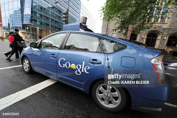 The Google self-driving car maneuvers through the streets of in Washington, DC May 14, 2012. The system on a modified Toyota Prius combines...