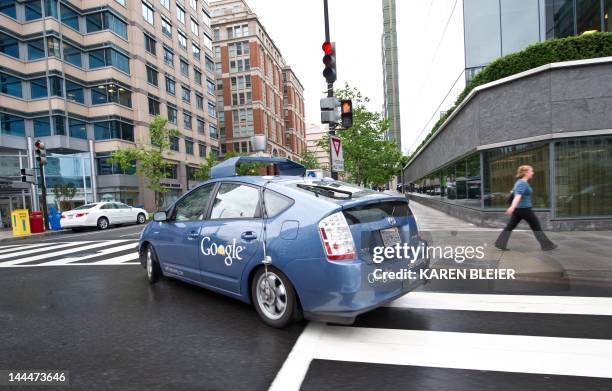 The Google self-driving car maneuvers through the streets of in Washington, DC May 14, 2012. The system on a modified Toyota Prius combines...