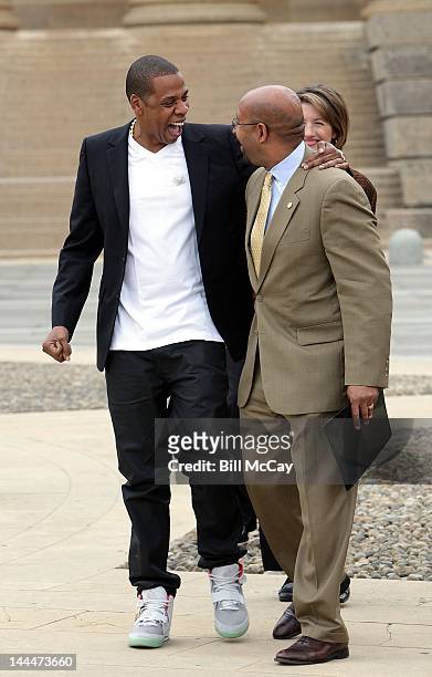 Jay-Z and Philadelphia Mayor Michael Nutter attend a press conference on the steps of the Philadelphia Museum of Art to announce that Jay-Z will...
