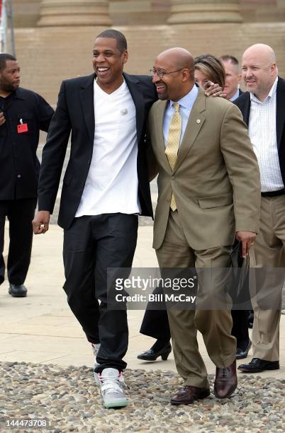 Jay-Z and Philadelphia Mayor Michael Nutter attend a press conference on the steps of the Philadelphia Museum of Art to announce that Jay-Z will...