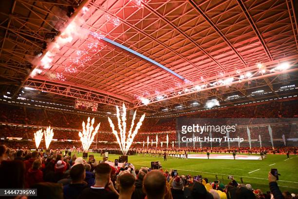 General view as fireworks are set off inside the stadium as players of both side's line up as prior to the Autumn International match between Wales...