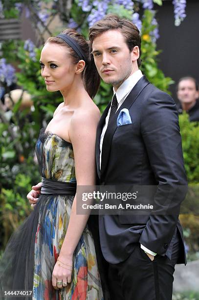 Actor Sam Claflin and Laura Haddock attend the World Premiere of 'Snow White And The Huntsman' at The Empire and Odeon Leicester Square on May 14,...