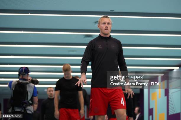 Simon Kjaer of Denmark walks out the tunnel for the warm up prior to the FIFA World Cup Qatar 2022 Group D match between France and Denmark at...
