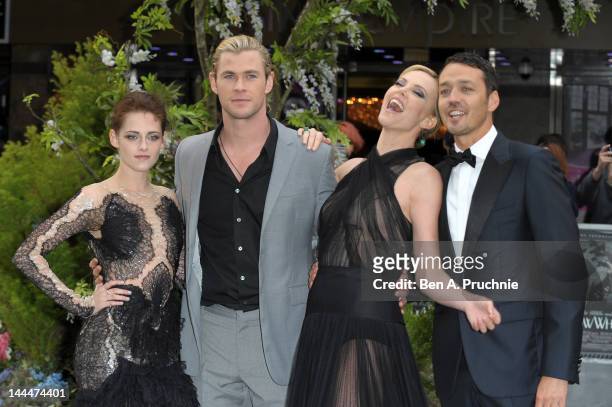 Actors Kristen Stewart, Chris Hemsworth, Charlize Theron and Director Rupert Sanders attend the World Premiere of 'Snow White And The Huntsman' at...