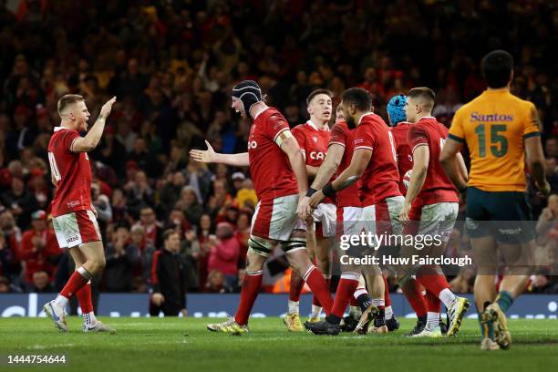 Adam Beard and Gareth Anscombe of Wales celebrate their side's third try during the Autumn International match between Wales and Australia at...