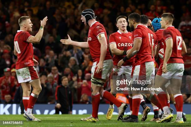 Adam Beard and Gareth Anscombe of Wales celebrate their side's third try during the Autumn International match between Wales and Australia at...