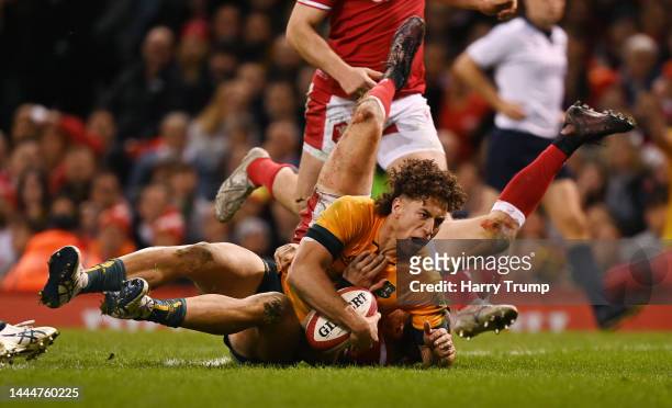 Mark Nawaqanitawase of Australia goes over to score their side's third try during the Autumn International match between Wales and Australia at...