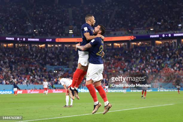 Kylian Mbappe of France celebrates after scoring their team's first goal with their teammate Theo Hernandez during the FIFA World Cup Qatar 2022...