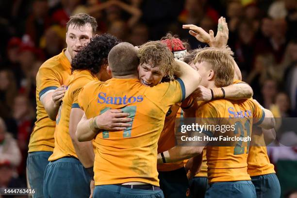 Players of Australia celebrate their side's victory after the Autumn International match between Wales and Australia at Principality Stadium on...