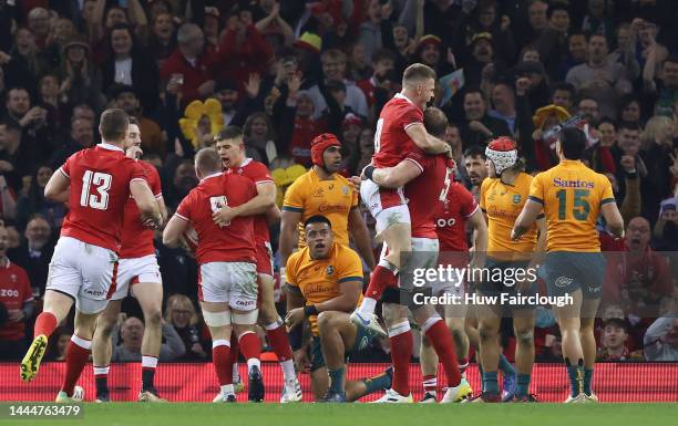 Players of Wales celebrate their side's first try scored by Jac Morgan of Wales during the Autumn International match between Wales and Australia at...