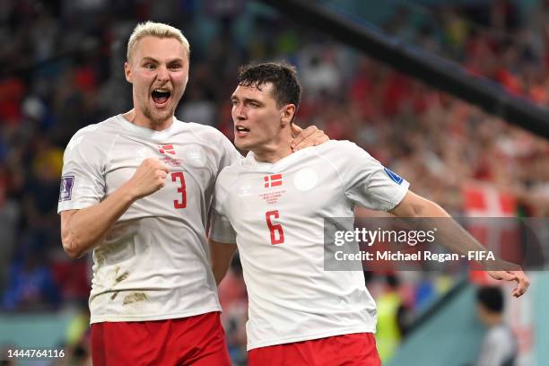 Andreas Christensen of Denmark celebrates with Victor Nelsson after scoring their team's first goal during the FIFA World Cup Qatar 2022 Group D...