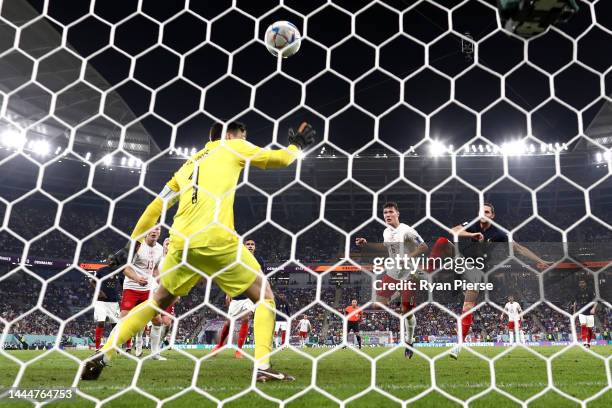 Andreas Christensen of Denmark scores their team's first goal past Hugo Lloris of France during the FIFA World Cup Qatar 2022 Group D match between...