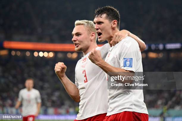 Andreas Christensen of Denmark celebrates with Victor Nelsson after scoring their team's first goal during the FIFA World Cup Qatar 2022 Group D...