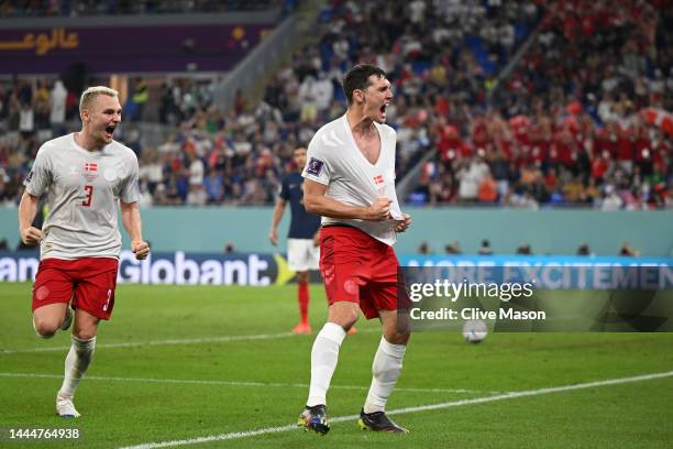 Andreas Christensen of Denmark celebrates after scoring their team's first goal during the FIFA World Cup Qatar 2022 Group D match between France and...