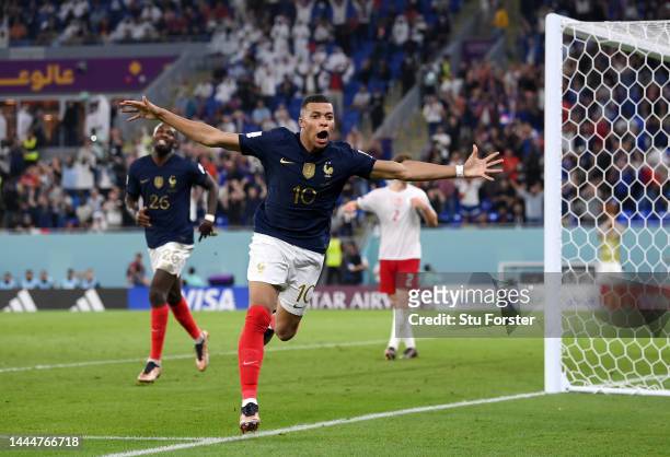 Kylian Mbappe of France celebrates after scoring their team's second goal during the FIFA World Cup Qatar 2022 Group D match between France and...