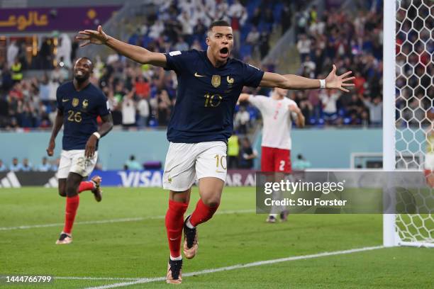 Kylian Mbappe of France celebrates after scoring their team's second goal during the FIFA World Cup Qatar 2022 Group D match between France and...