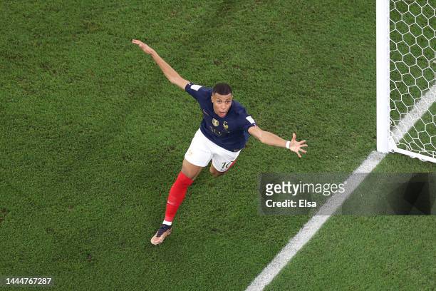 Kylian Mbappe of France celebrates after scoring their team's second goal during the FIFA World Cup Qatar 2022 Group D match between France and...