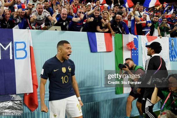 Kylian Mbappe of France celebrates after scoring their team's second goal during the FIFA World Cup Qatar 2022 Group D match between France and...