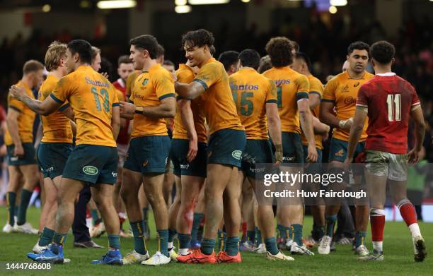 The Australian team celebrates after winning the Autumn International match between Wales and Australia at Principality Stadium on November 26, 2022...