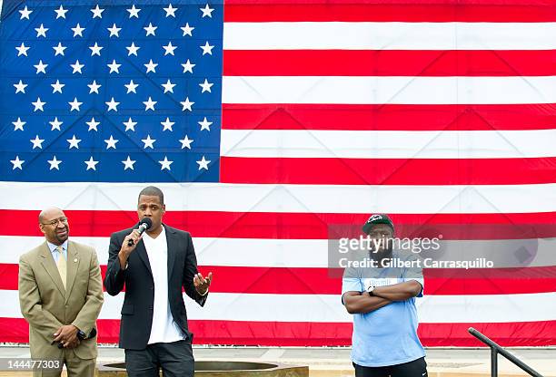 Philadelphia Mayor Michael Nutter, Jay-Z and rapper Freeway attend the press conference announcing the 'Budweiser Made in America' music festival at...
