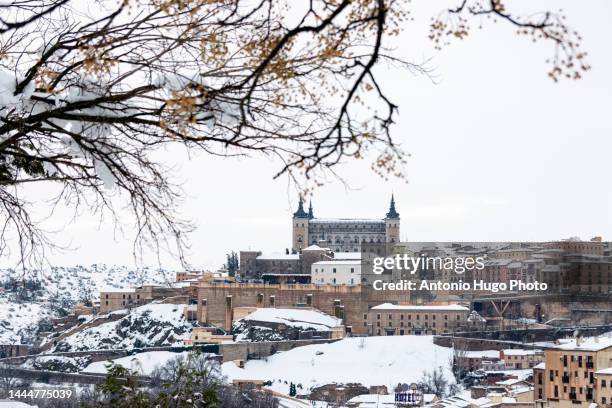 view of the city of toledo in the snow. - toledo province stock pictures, royalty-free photos & images