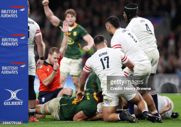 Eben Etzebeth of South Africa goes over to score their side's second try during the Autumn International match between England and South Africa at...