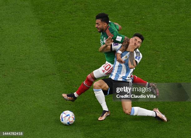 Alexis Vega of Mexico and Gonzalo Montiel of Argentina compete for the ball during the FIFA World Cup Qatar 2022 Group C match between Argentina and...