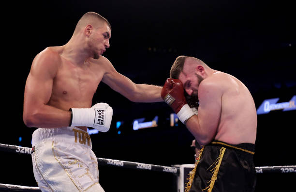 Tommy Fletcher of Great Britain exchanges punches with Jiri Krejci of Czech Republic during their Cruiserweight fight at The O2 Arena on November 26,...