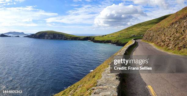 slea head drive, driving the wild atlantic way on the dingle peninsula, ireland - 半島 ストックフォトと画像