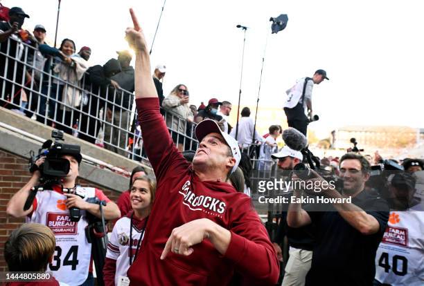 Head coach Shane Beamer of the South Carolina Gamecocks celebrates after defeating the Clemson Tigers at Memorial Stadium on November 26, 2022 in...
