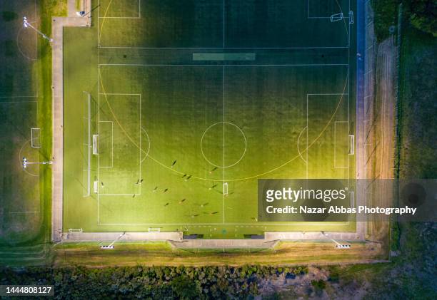top looking down at soccer ground. - aerial football photos et images de collection