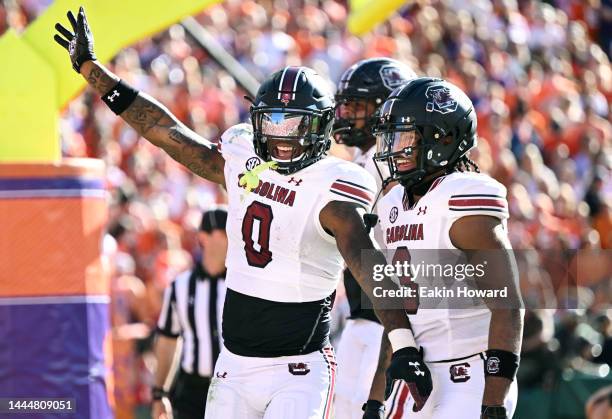 Jaheim Bell and Antwane Wells Jr. #3 of the South Carolina Gamecocks celebrate Bell's third quarter touchdown against the Clemson Tigers at Memorial...