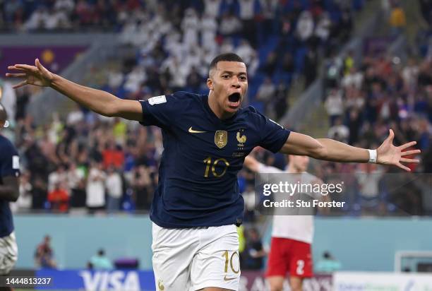 France striker Kylian Mbappe celebrates after scoring the second goal during the FIFA World Cup Qatar 2022 Group D match between France and Denmark...
