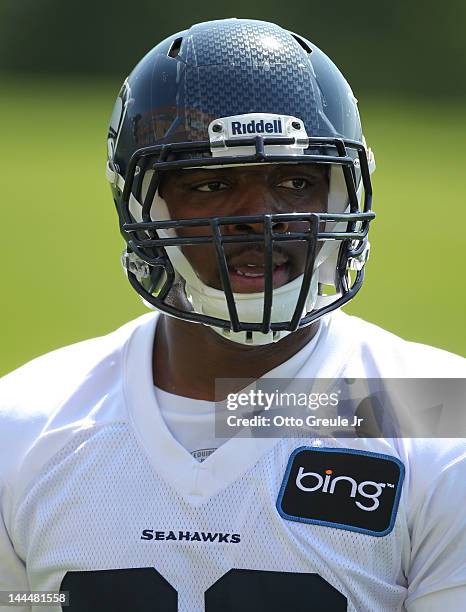 Defensive end Greg Scruggs of the Seattle Seahawks looks on during minicamp at the Virginia Mason Athletic Center on May 11, 2012 in Renton,...